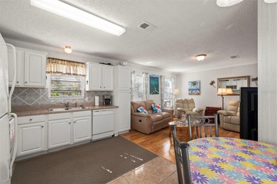 Rare opportunity to own a furnished 2-bedroom, 2-bath singlewide on Kings Gate Golf Club in Florida - for sale on GolfHomes.com, golf home, golf lot