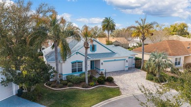 This updated Bridgeport Designer home with a golf cart garage is on Glenview Championship Golf and Country Club in Florida - for sale on GolfHomes.com, golf home, golf lot