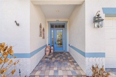 This updated Bridgeport Designer home with a golf cart garage is on Glenview Championship Golf and Country Club in Florida - for sale on GolfHomes.com, golf home, golf lot