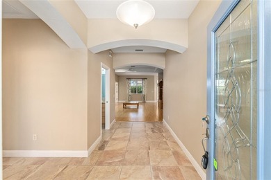 This updated Bridgeport Designer home with a golf cart garage is on Glenview Championship Golf and Country Club in Florida - for sale on GolfHomes.com, golf home, golf lot