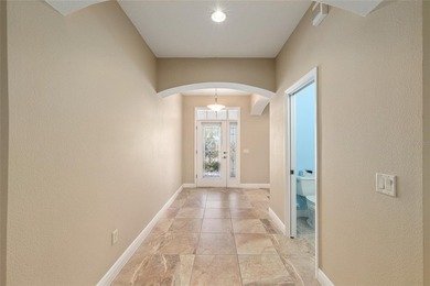 This updated Bridgeport Designer home with a golf cart garage is on Glenview Championship Golf and Country Club in Florida - for sale on GolfHomes.com, golf home, golf lot