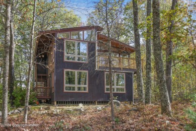 Welcome to your serene sanctuary, filled with natural light and on Lords Valley Country Club, Inc in Pennsylvania - for sale on GolfHomes.com, golf home, golf lot