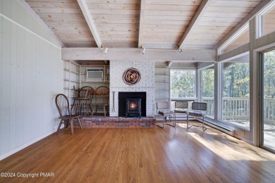 Welcome to your serene sanctuary, filled with natural light and on Lords Valley Country Club, Inc in Pennsylvania - for sale on GolfHomes.com, golf home, golf lot