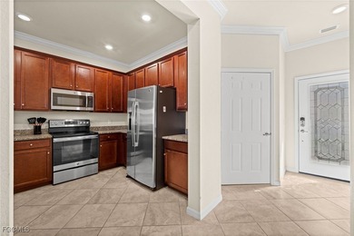 Welcome to Marbella! This well-maintained townhome impresses on Heritage Palms Golf and Country Club in Florida - for sale on GolfHomes.com, golf home, golf lot