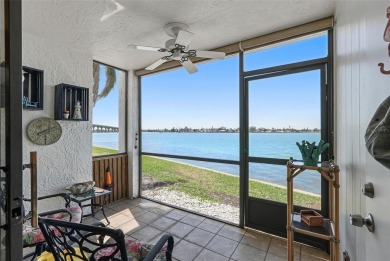 MILLION DOLLAR WATER VIEWS! From the moment you enter this on Isla Del Sol Yacht and Country Club in Florida - for sale on GolfHomes.com, golf home, golf lot