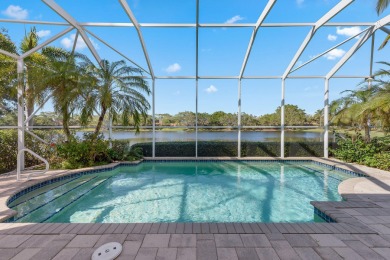 Nestled on a lakefront homesite in the desirable Mallard's on The Rookery At Marco in Florida - for sale on GolfHomes.com, golf home, golf lot