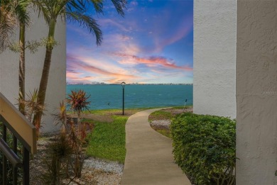 MILLION DOLLAR WATER VIEWS! From the moment you enter this on Isla Del Sol Yacht and Country Club in Florida - for sale on GolfHomes.com, golf home, golf lot