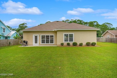 Experience unparalleled luxury with this bespoke residence by on Holiday Golf Club in Florida - for sale on GolfHomes.com, golf home, golf lot