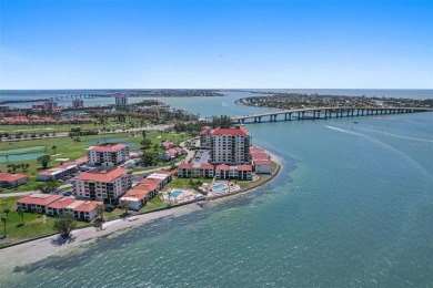 MILLION DOLLAR WATER VIEWS! From the moment you enter this on Isla Del Sol Yacht and Country Club in Florida - for sale on GolfHomes.com, golf home, golf lot