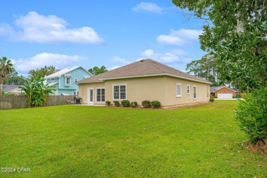 Experience unparalleled luxury with this bespoke residence by on Holiday Golf Club in Florida - for sale on GolfHomes.com, golf home, golf lot