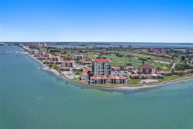 MILLION DOLLAR WATER VIEWS! From the moment you enter this on Isla Del Sol Yacht and Country Club in Florida - for sale on GolfHomes.com, golf home, golf lot