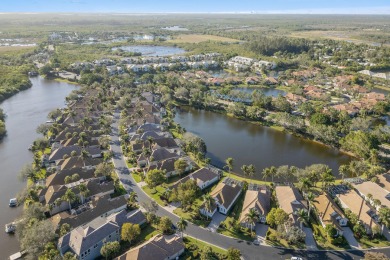 Nestled on a lakefront homesite in the desirable Mallard's on The Rookery At Marco in Florida - for sale on GolfHomes.com, golf home, golf lot