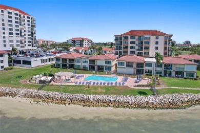 MILLION DOLLAR WATER VIEWS! From the moment you enter this on Isla Del Sol Yacht and Country Club in Florida - for sale on GolfHomes.com, golf home, golf lot