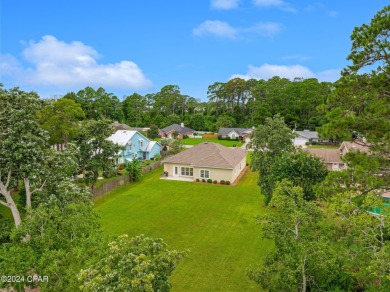 Experience unparalleled luxury with this bespoke residence by on Holiday Golf Club in Florida - for sale on GolfHomes.com, golf home, golf lot