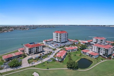 MILLION DOLLAR WATER VIEWS! From the moment you enter this on Isla Del Sol Yacht and Country Club in Florida - for sale on GolfHomes.com, golf home, golf lot