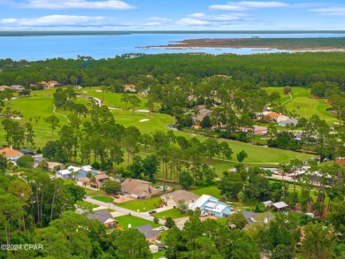 Experience unparalleled luxury with this bespoke residence by on Holiday Golf Club in Florida - for sale on GolfHomes.com, golf home, golf lot