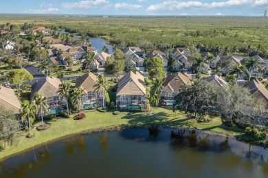 Nestled on a lakefront homesite in the desirable Mallard's on The Rookery At Marco in Florida - for sale on GolfHomes.com, golf home, golf lot