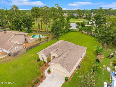 Experience unparalleled luxury with this bespoke residence by on Holiday Golf Club in Florida - for sale on GolfHomes.com, golf home, golf lot