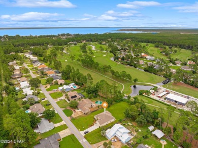 Experience unparalleled luxury with this bespoke residence by on Holiday Golf Club in Florida - for sale on GolfHomes.com, golf home, golf lot