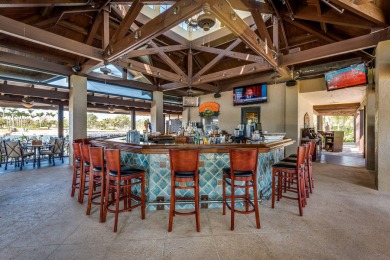 Nestled on a lakefront homesite in the desirable Mallard's on The Rookery At Marco in Florida - for sale on GolfHomes.com, golf home, golf lot