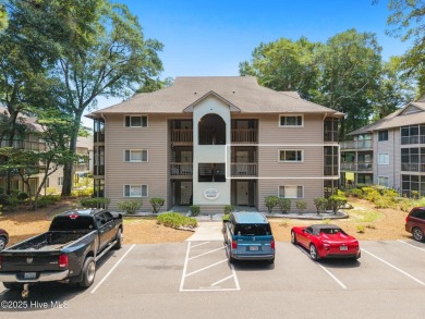 Welcome to your turnkey coastal retreat, fully furnished and on Oyster Bay Golf Links in North Carolina - for sale on GolfHomes.com, golf home, golf lot