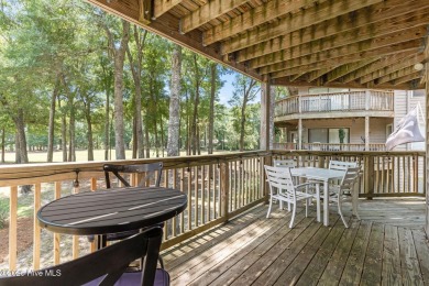 Welcome to your turnkey coastal retreat, fully furnished and on Oyster Bay Golf Links in North Carolina - for sale on GolfHomes.com, golf home, golf lot