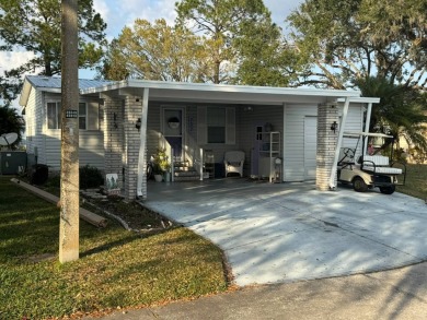 How would you like a cute home on a quiet cul-du-sac with on Golden Lakes Golf Course in Florida - for sale on GolfHomes.com, golf home, golf lot