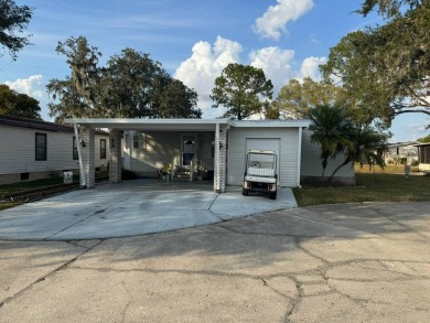 How would you like a cute home on a quiet cul-du-sac with on Golden Lakes Golf Course in Florida - for sale on GolfHomes.com, golf home, golf lot