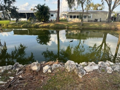 How would you like a cute home on a quiet cul-du-sac with on Golden Lakes Golf Course in Florida - for sale on GolfHomes.com, golf home, golf lot