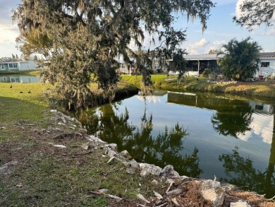 How would you like a cute home on a quiet cul-du-sac with on Golden Lakes Golf Course in Florida - for sale on GolfHomes.com, golf home, golf lot