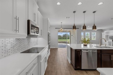 One or more photo(s) were virtually staged. Tucked away at the on Red Tail Golf Club in Florida - for sale on GolfHomes.com, golf home, golf lot