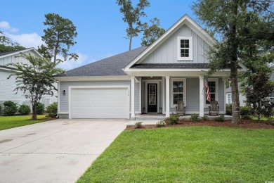 Welcome to this elegant 3-bedroom, 2.5-bath home located in the on Tidewater Golf Club and Plantation in South Carolina - for sale on GolfHomes.com, golf home, golf lot