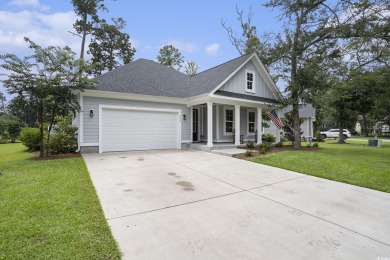 Welcome to this elegant 3-bedroom, 2.5-bath home located in the on Tidewater Golf Club and Plantation in South Carolina - for sale on GolfHomes.com, golf home, golf lot