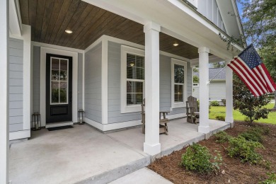 Welcome to this elegant 3-bedroom, 2.5-bath home located in the on Tidewater Golf Club and Plantation in South Carolina - for sale on GolfHomes.com, golf home, golf lot