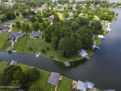 Double Boat Slip, Pier and one of the last LARGE waterfront lots on Lake Caroline Golf Club in Mississippi - for sale on GolfHomes.com, golf home, golf lot