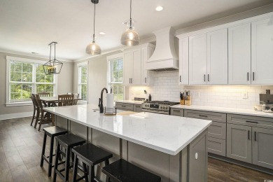 Welcome to this elegant 3-bedroom, 2.5-bath home located in the on Tidewater Golf Club and Plantation in South Carolina - for sale on GolfHomes.com, golf home, golf lot