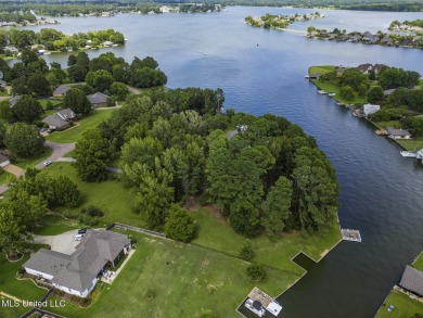 Double Boat Slip, Pier and one of the last LARGE waterfront lots on Lake Caroline Golf Club in Mississippi - for sale on GolfHomes.com, golf home, golf lot