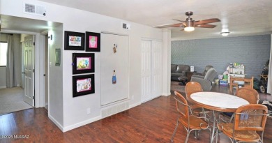 Lovely light and bright 2 bed/2bath corner, upstairs condominium on Oro Valley Country Club in Arizona - for sale on GolfHomes.com, golf home, golf lot