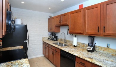 Lovely light and bright 2 bed/2bath corner, upstairs condominium on Oro Valley Country Club in Arizona - for sale on GolfHomes.com, golf home, golf lot