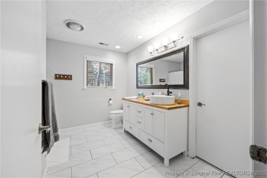 Discover this charming Pinehurst retreat in an ideal blend of on Pinehurst Resort and Country Club in North Carolina - for sale on GolfHomes.com, golf home, golf lot