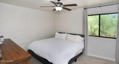 Lovely light and bright 2 bed/2bath corner, upstairs condominium on Oro Valley Country Club in Arizona - for sale on GolfHomes.com, golf home, golf lot