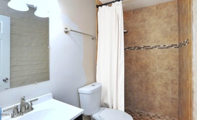 Lovely light and bright 2 bed/2bath corner, upstairs condominium on Oro Valley Country Club in Arizona - for sale on GolfHomes.com, golf home, golf lot