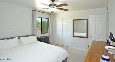 Lovely light and bright 2 bed/2bath corner, upstairs condominium on Oro Valley Country Club in Arizona - for sale on GolfHomes.com, golf home, golf lot