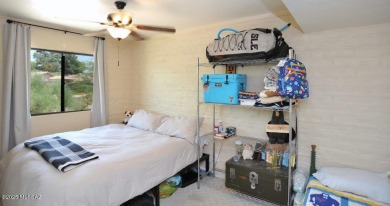 Lovely light and bright 2 bed/2bath corner, upstairs condominium on Oro Valley Country Club in Arizona - for sale on GolfHomes.com, golf home, golf lot