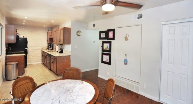 Lovely light and bright 2 bed/2bath corner, upstairs condominium on Oro Valley Country Club in Arizona - for sale on GolfHomes.com, golf home, golf lot
