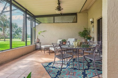 GOLF COURSE VIEWS! Desirable CARROLLWOOD VILLAGE condo/townhome on Carrollwood Country Club in Florida - for sale on GolfHomes.com, golf home, golf lot