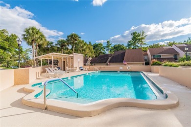 GOLF COURSE VIEWS! Desirable CARROLLWOOD VILLAGE condo/townhome on Carrollwood Country Club in Florida - for sale on GolfHomes.com, golf home, golf lot