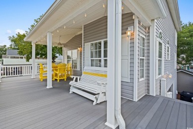This spacious 3 Bedroom 2.5 Bath raised 1.5 story beach house is on Prestwick Country Club in South Carolina - for sale on GolfHomes.com, golf home, golf lot