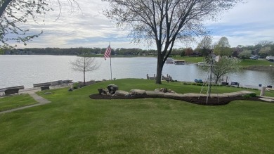 Welcome home to this beautiful, updated, unique charming rustic on Lakes of the Four Seasons Country Club in Indiana - for sale on GolfHomes.com, golf home, golf lot