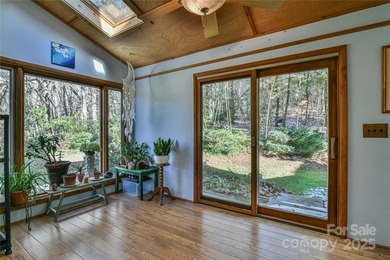 A Sunlit Corner Retreat in The Lynx - Wrapped in Woods, Light on Black Mountain Golf Course in North Carolina - for sale on GolfHomes.com, golf home, golf lot